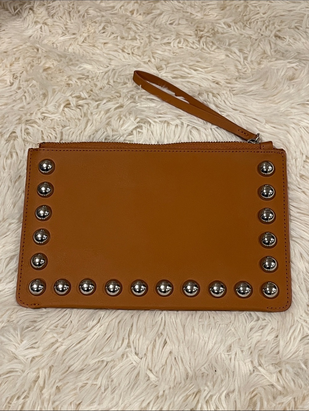 Mango riveted tan wristlet clutch